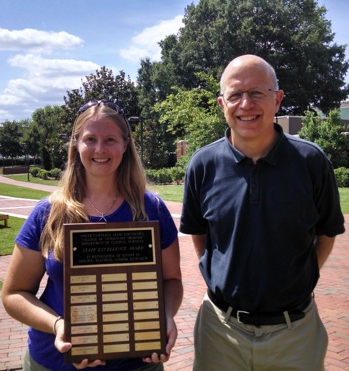 Heather Broadhursts (left) with CVM CMAST's Dr. Craig Harms at Monday's ceremony.