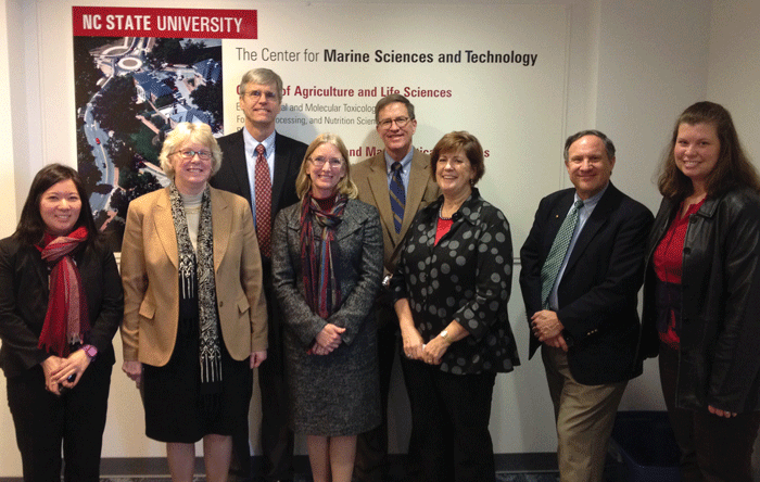 Coastal and Marine Sciences External Review Team from the American Association for the Advancement of Sciences, as well as members of the UNC General Administration and NC State University.  From left to right: Dr. Rieko Yajima (AAAS), Dr. Nancy Targett (University of Delaware), Dr. Steven Lohrenz (University of Massachusetts), Dr. Jackie Dixon (University of South Florida), Dr. Chris Brown (UNC General Administration), Dr. Terri Lomax (NC State University), Dr. Chris D’Elia (Louisiana State University), and Dr. Courtney Thornton (UNC General Administration).