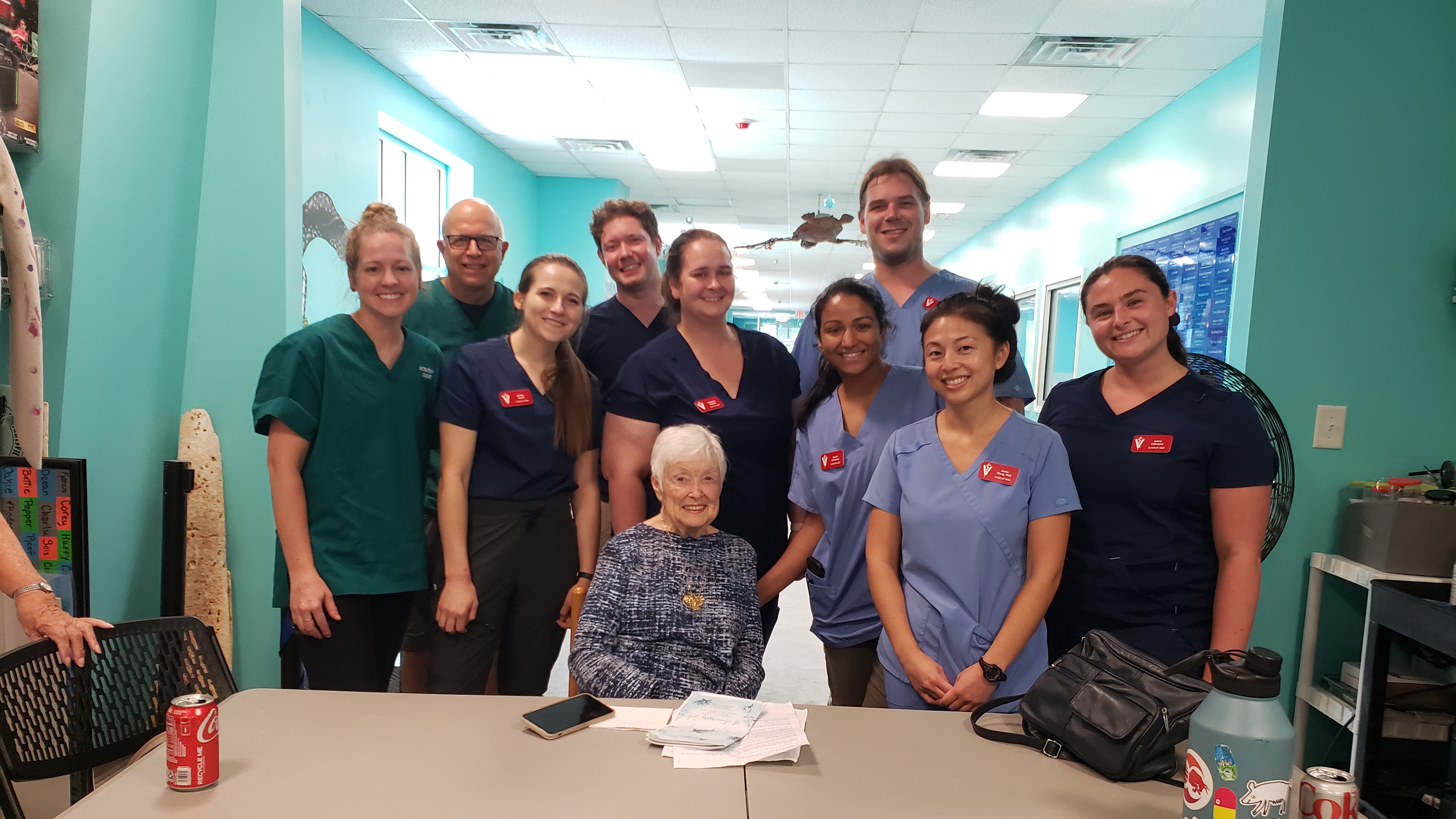 Veterinary students and instructors with Ms. Jean Beasley (sitting, center).