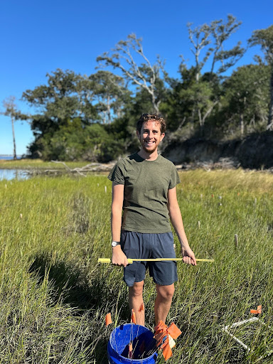 Trevyn standing in the marsh